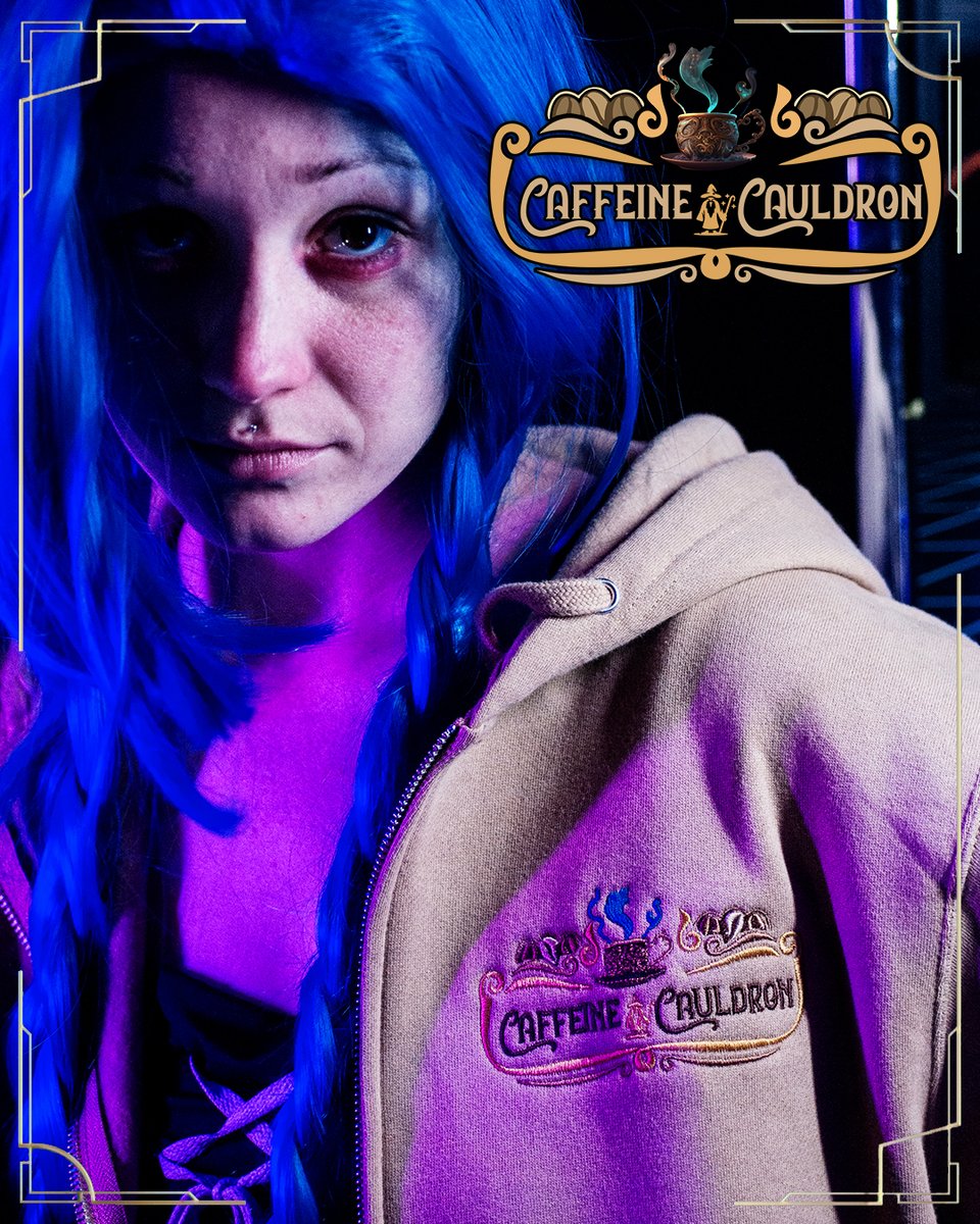 tucgamesgadgets's tweet photo. Jinx recently got a new fit upgrade to show her love for the Caffeine Cauldron, her favorite geeky cafe! Have you picked up your hoodie yet, or do you lean more towards their cool coffee mugs? #localcafe #localcoffeeshop #hoodie #hoodieweather https://t.co/yRQBWAlDH4