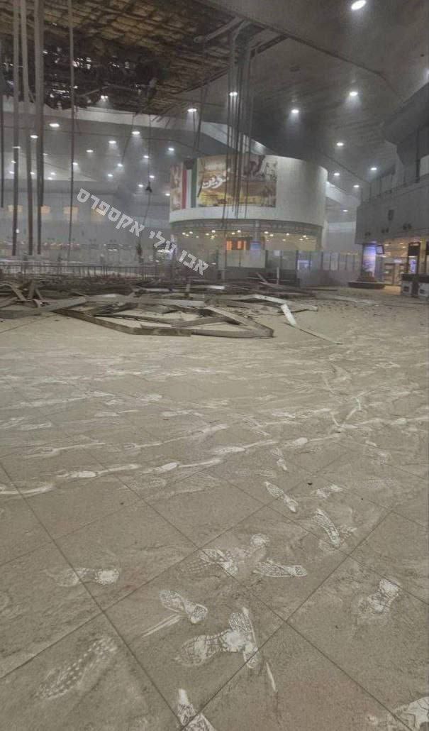 ConflictAlarm's tweet image. Footage from inside Kuwait International Airport after an Iranian drone strike.

Debris and damage visible across the terminal. Workers were reportedly injured.

Iran is attacking civilian airports in neutral countries.