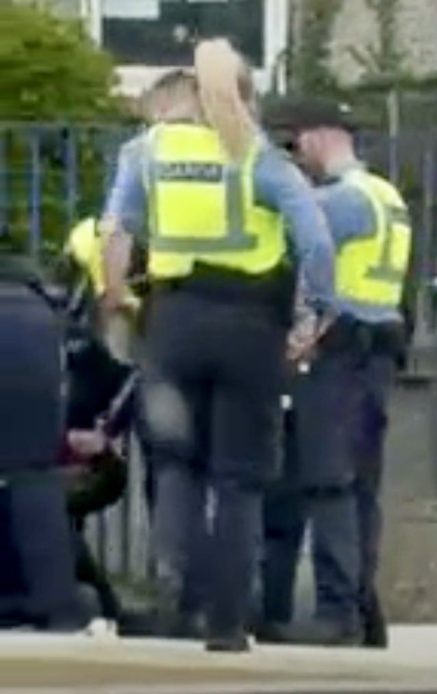 BenGilroyIRL's tweet photo. Drove through Navan today,  there were numerous squad cars and some ambulances driving around erratically then I noticed several Gardaí trying to restrain an imported voter while he was violently resisting arrest. 

Meanwhile, the Government continues to import their new voters while doing so they have endangered our children, Ireland is doomed.
