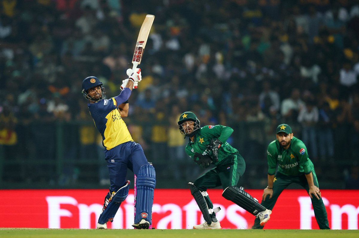 IndianBhargav's tweet photo. TAKE A BOW, DASUN SHANAKA. 🤯 - 76* (31) with 2 fours and 8 sixes. 

One of the craziest knocks in T20 World Cup history. 

 He almost won Sri Lanka the match with his brutal knock; he went absolutely bonkers. 🥶

Need reviews of wide ball in T20 games!!!🫣

#SLvsPAk https://t.co/AFHWWXVyH0