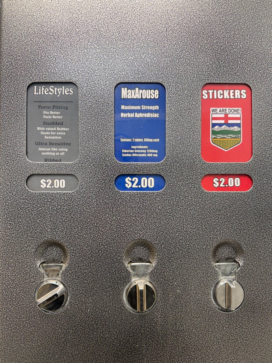 zedlacher's tweet photo. Spotted in an Alberta men’s room. The first two are for protection during sex, the one on the right is to get screwed. https://t.co/E5hYYnUtPt