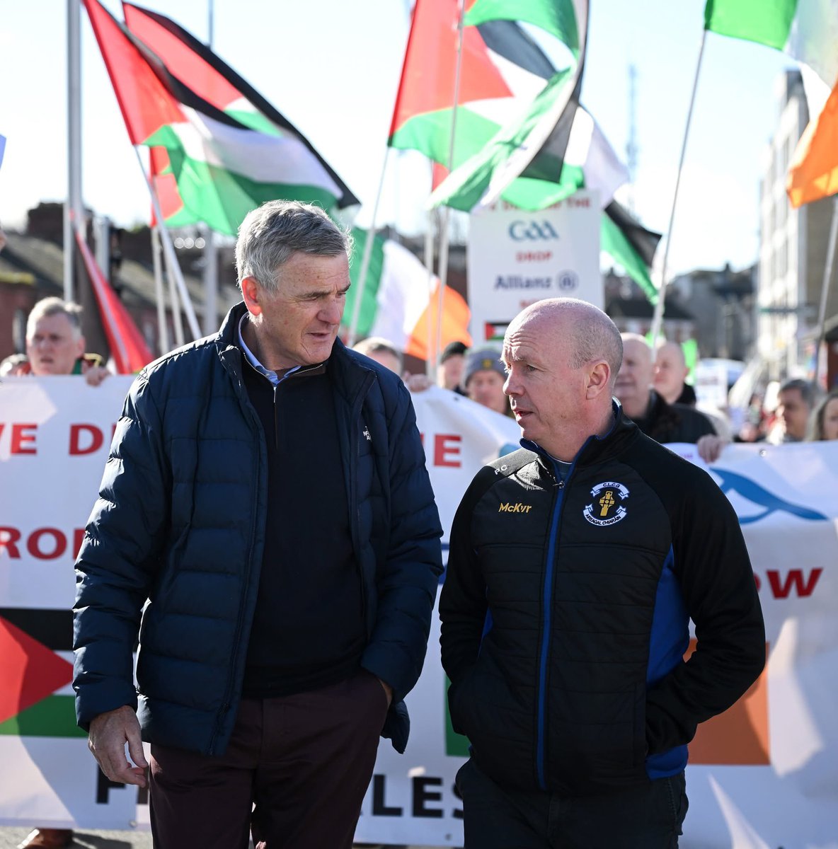 OrfhlaithBegley's tweet photo. Peter Canavan and Colm O’Rourke standing with Palestine and protesting the GAA's sponsorship deal with Allianz outside Croke Park today 

🇮🇪🤝🇵🇸 https://t.co/b2GWRJVX3q