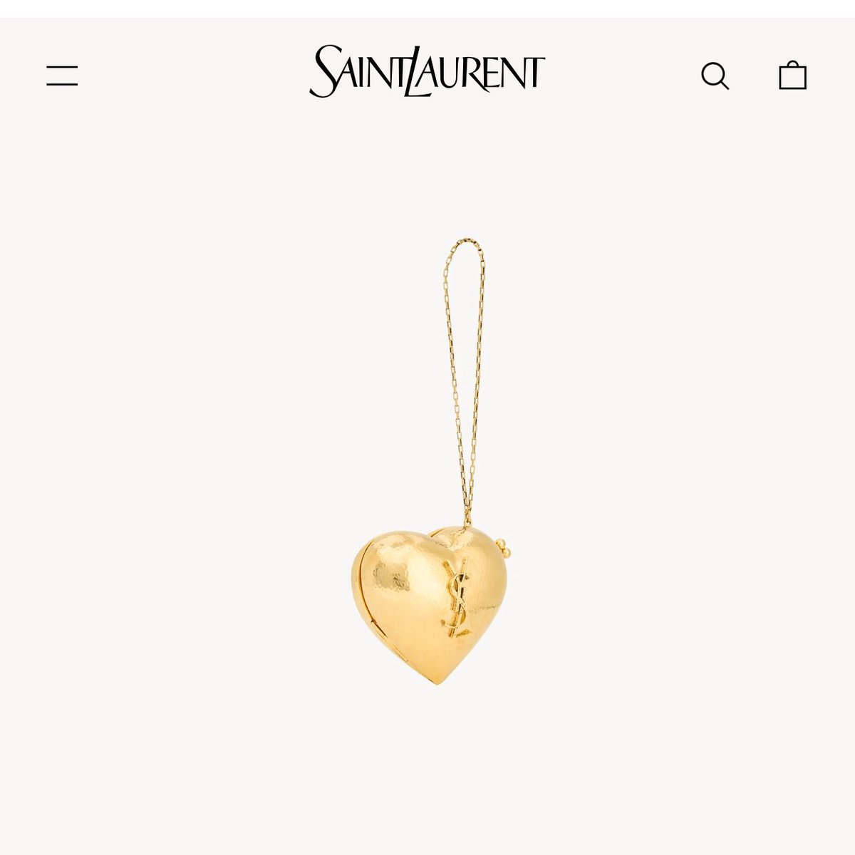 charts_rose's tweet photo. ROSÉ once again teases “golden heart”, this time with a handbag. https://t.co/OhcYFbAFP3