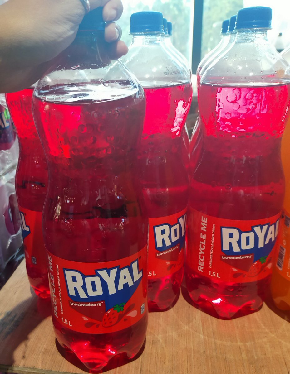 i saw strawberry flavored royal for the first time and bro it looks like the gas that tricycle drivers buy in coke glass kasalo bottles what the hell