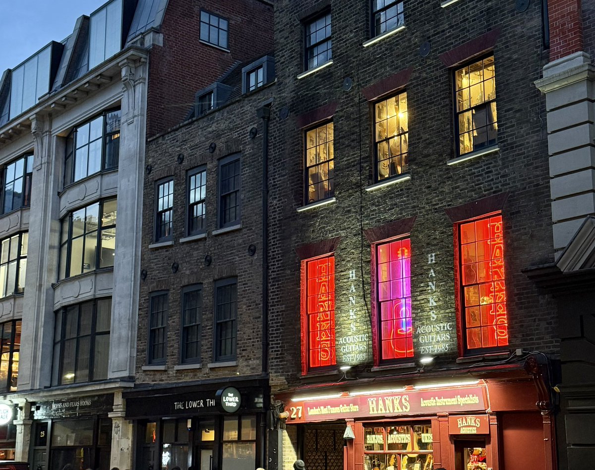 CormStrikeFan's tweet photo. One of my favourite quotes in #TheCuckoosCalling: 

“This was the hour when he found London most lovable; the working day over, her pub windows were warm and jewel-like, her streets thrummed with life, and the indefatigable permanence of her aged buildings, softened by the street lights, became strangely reassuring. We have seen plenty like you, they seemed to murmur soothingly, as he limped along Oxford Street carrying a boxed-up camp bed. Seven and a half million hearts were beating in close proximity in this heaving old city, and many, after all, would be aching far worse than his. Walking wearily past closing shops, while the heavens turned indigo above him, Strike found solace in vastness and anonymity.”