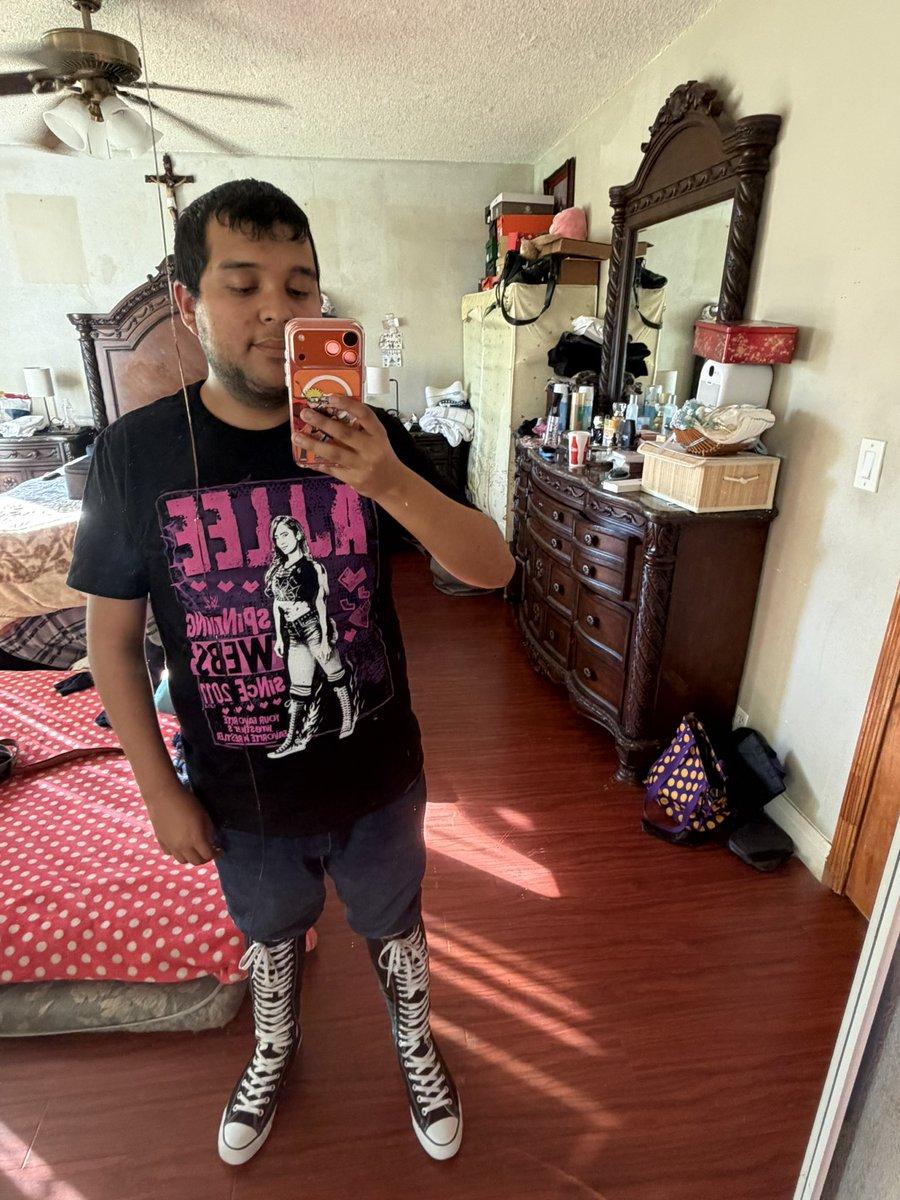 messi5681's tweet photo. My Aj Lee @TheAJMendez shirt came in today right on time before #EliminationChamber it’s so cool and awesome time to rep my favorite woman wrestler of all time to win her first title in a decade https://t.co/crljPdTplb