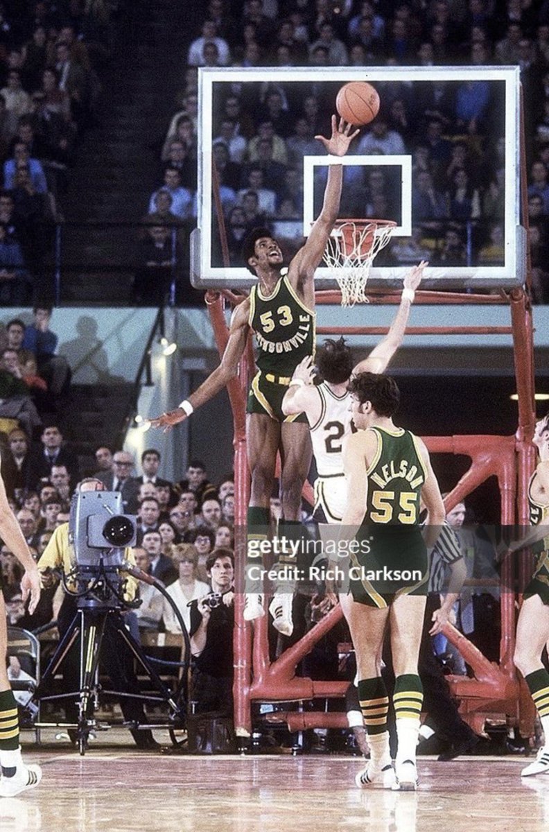 One of my favorite sports pics. Artis Gilmore at Jacksonville way above the rim while Nelson ponders what he’s going to eat for dinner