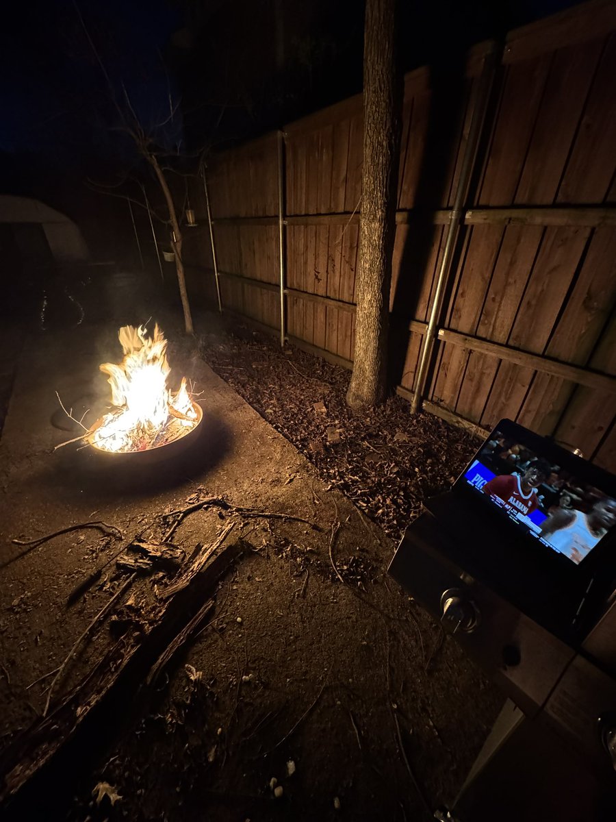 BeerDomestic's tweet photo. Burning my yard debris and watching tide hoops on my iPad that’s leaned up on my grill. There might be slight redneck concerns. https://t.co/Jsa1fubBys