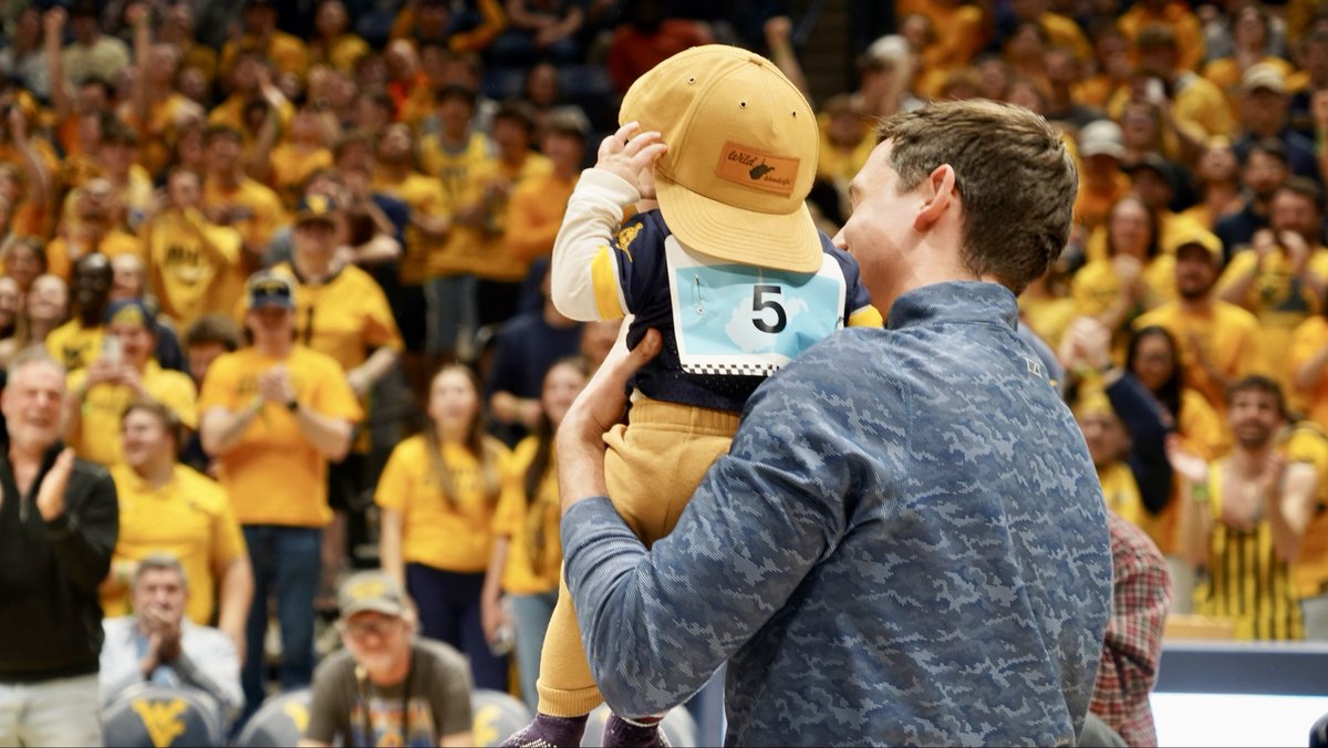 WVTreasury's tweet photo. This evening, families participated in the SMART529 Diapers to Degrees Dash at the @WVUhoops game with Treasurer Pack presenting the winner with a check that goes into a SMART529 savings account! Thank you to all who participated! https://t.co/96edHYshIb
