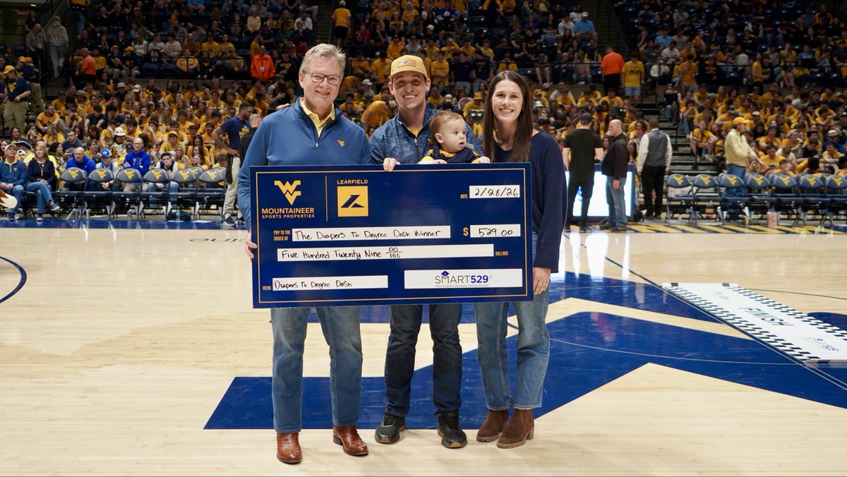 WVTreasury's tweet photo. This evening, families participated in the SMART529 Diapers to Degrees Dash at the @WVUhoops game with Treasurer Pack presenting the winner with a check that goes into a SMART529 savings account! Thank you to all who participated! https://t.co/96edHYshIb