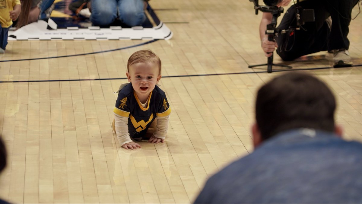 WVTreasury's tweet photo. This evening, families participated in the SMART529 Diapers to Degrees Dash at the @WVUhoops game with Treasurer Pack presenting the winner with a check that goes into a SMART529 savings account! Thank you to all who participated! https://t.co/96edHYshIb