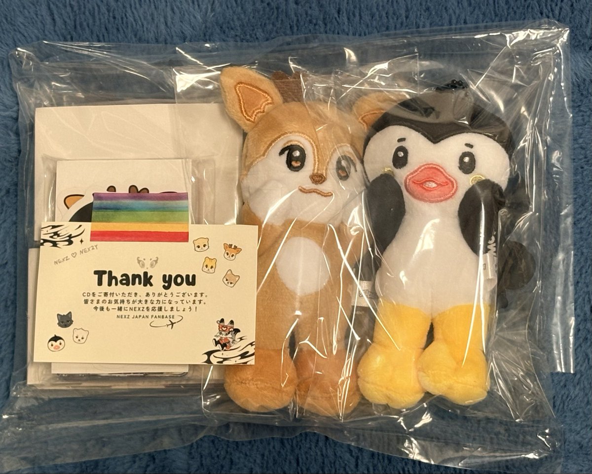 ファンベ様@NEXZ_JPFB より寄付企画のNEXZOOとトレカが届きました