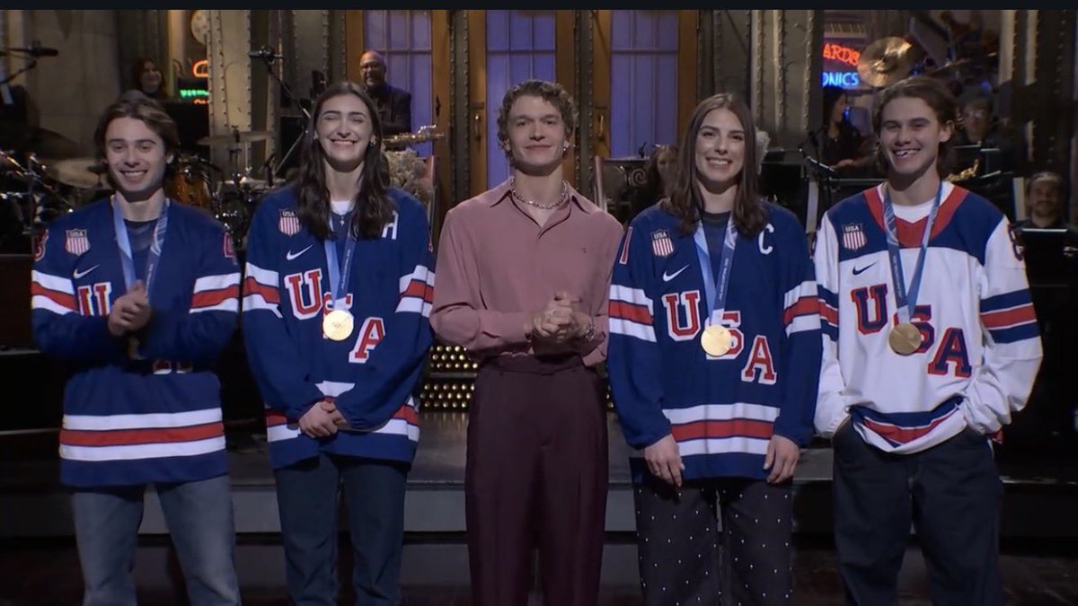 BuzzingPop's tweet photo. Connor Storrie and the Olympic gold medalist hockey players on #SNL. https://t.co/ZmDgxF39zx