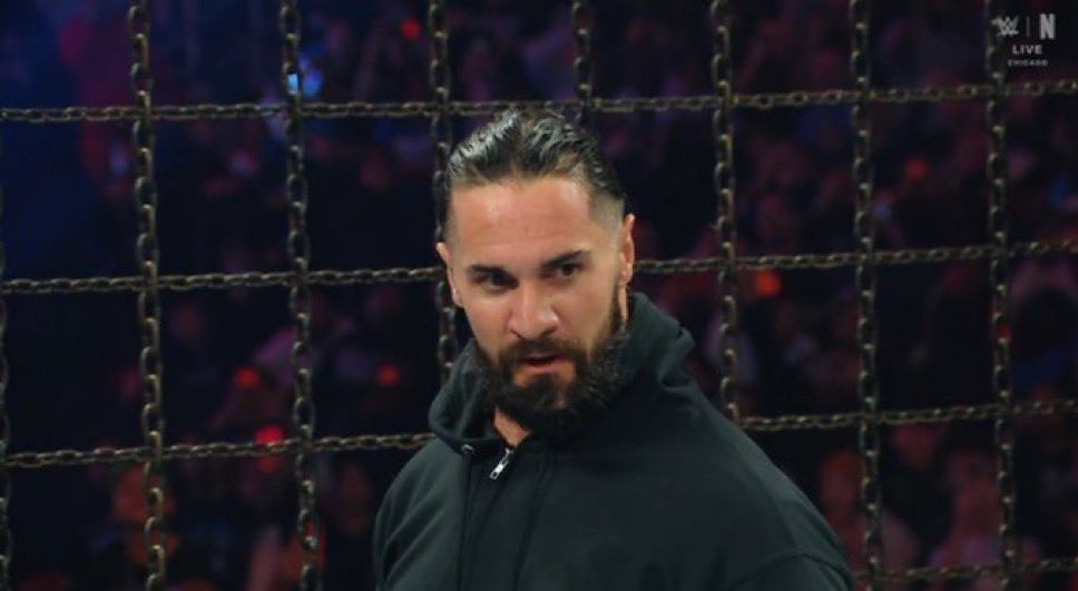 harlanwheelerr's tweet image. Seth rollins has returned as he was revealed to be the masked man 😁🖤 
as he stomped logan paul head into 
the canvas costing him his #eliminationchamber opportunity