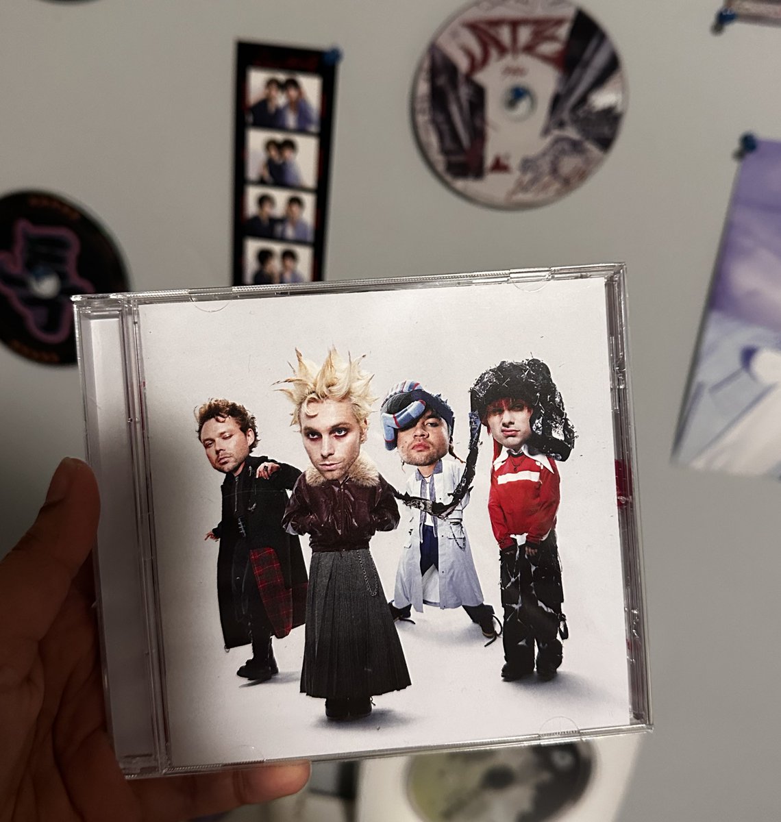 YOURVAP0R's tweet photo. my first ever @5SOS cd after stanning them for 7 whole years https://t.co/mAHlihbe1i
