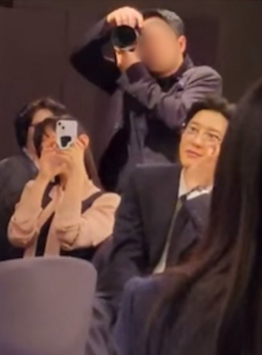 The way Chanyeol is looking at wedding singer Junmyeon &amp; his sister filming him too 🥹