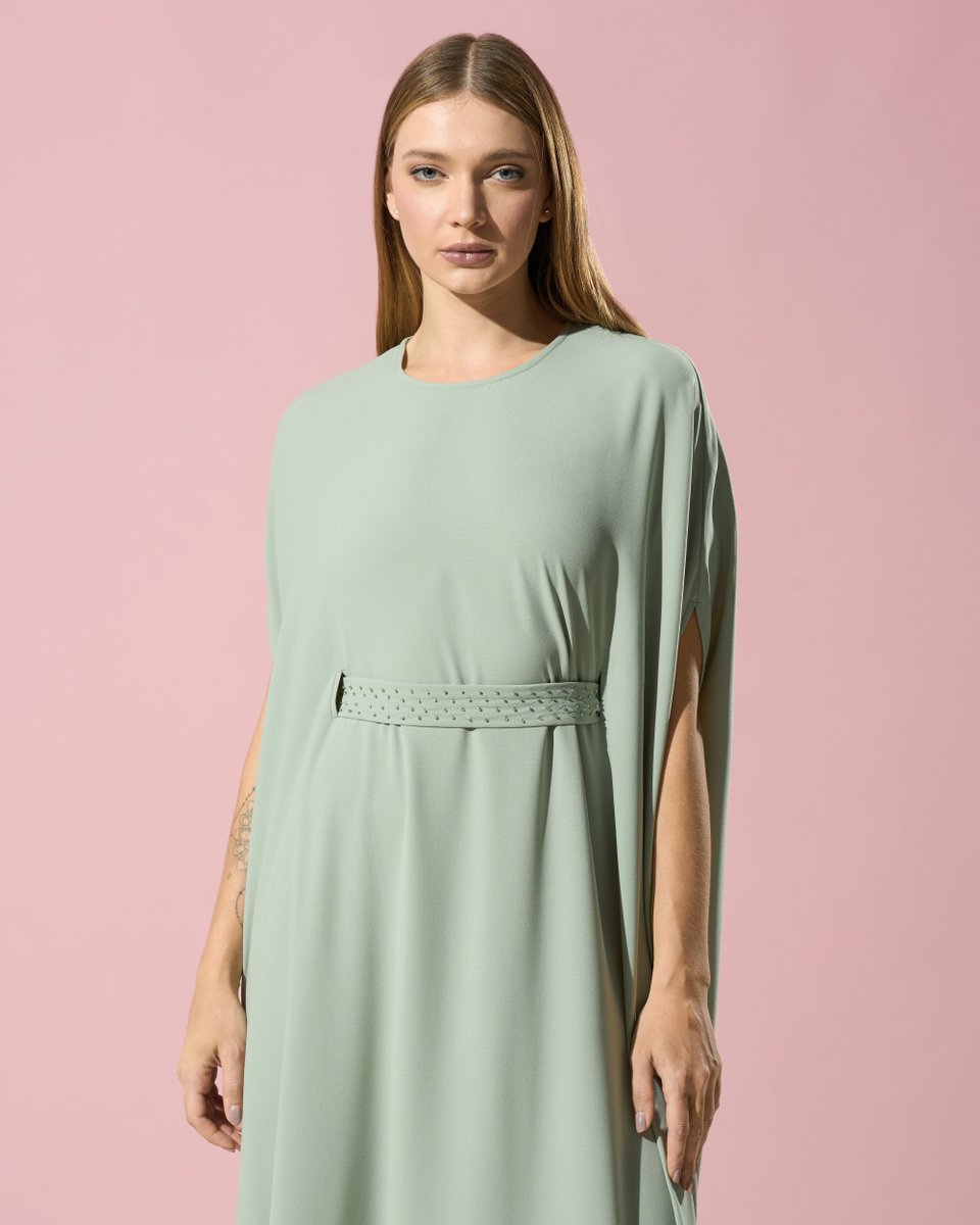 pierrecardinuae's tweet image. Sculpted minimalism. A structured silhouette in muted sage for the modern icon. #PierreCardin #RamadanCollection