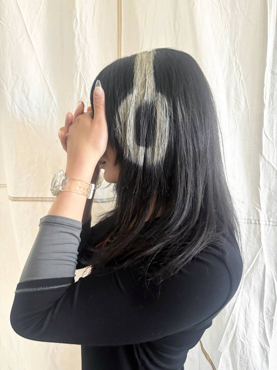 hair so iconic you don't even need to see the face
