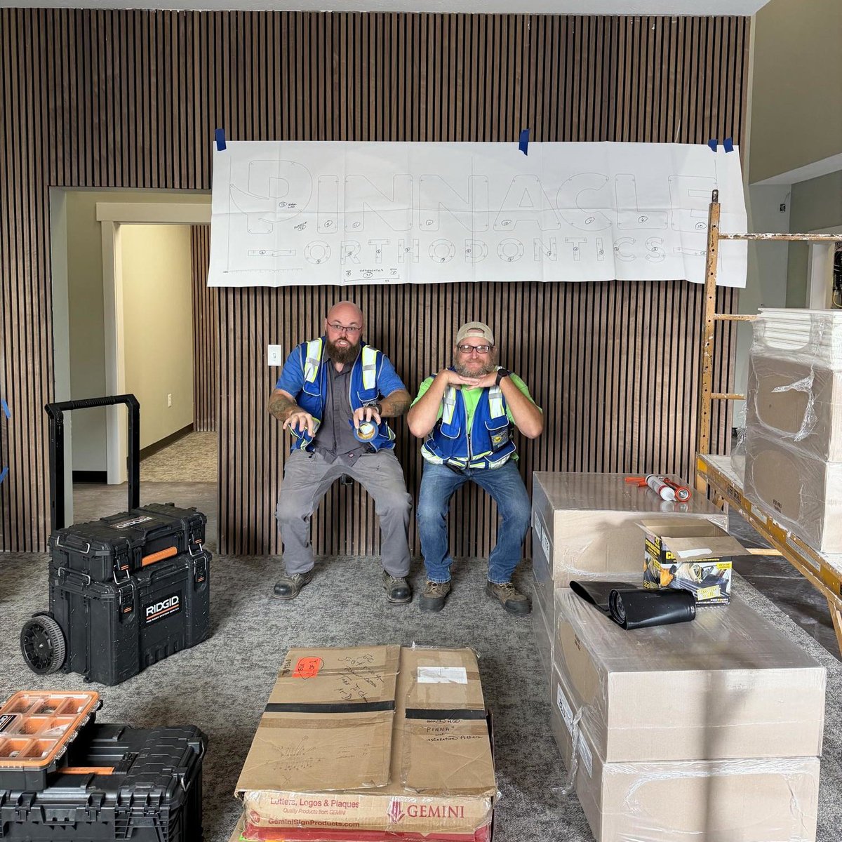 We are uncertain about what is happening here, but we are grateful for this hardworking duo! 😂 | #signstudio #notjustsigns #completevisualmarketing #yoursignsource #nwasigns