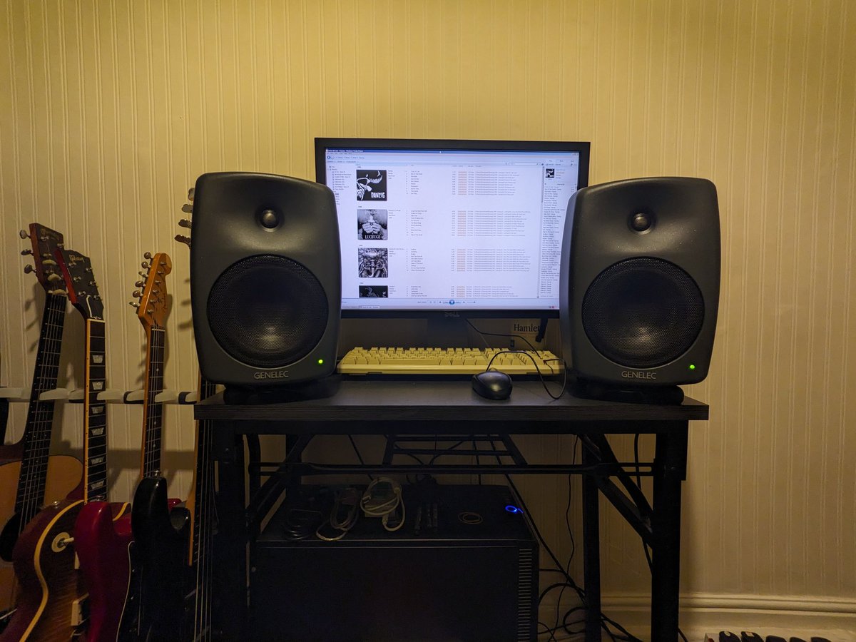 JosephSprint's tweet photo. Genelec 8040B monitoring. Even in a shit room they sound amazing. The desk is temporary. I will be adding a RME UFXIII audio interface and a Neve 1073DPX preamp for a truly world class home recording setup. https://t.co/jx1tYakRIW