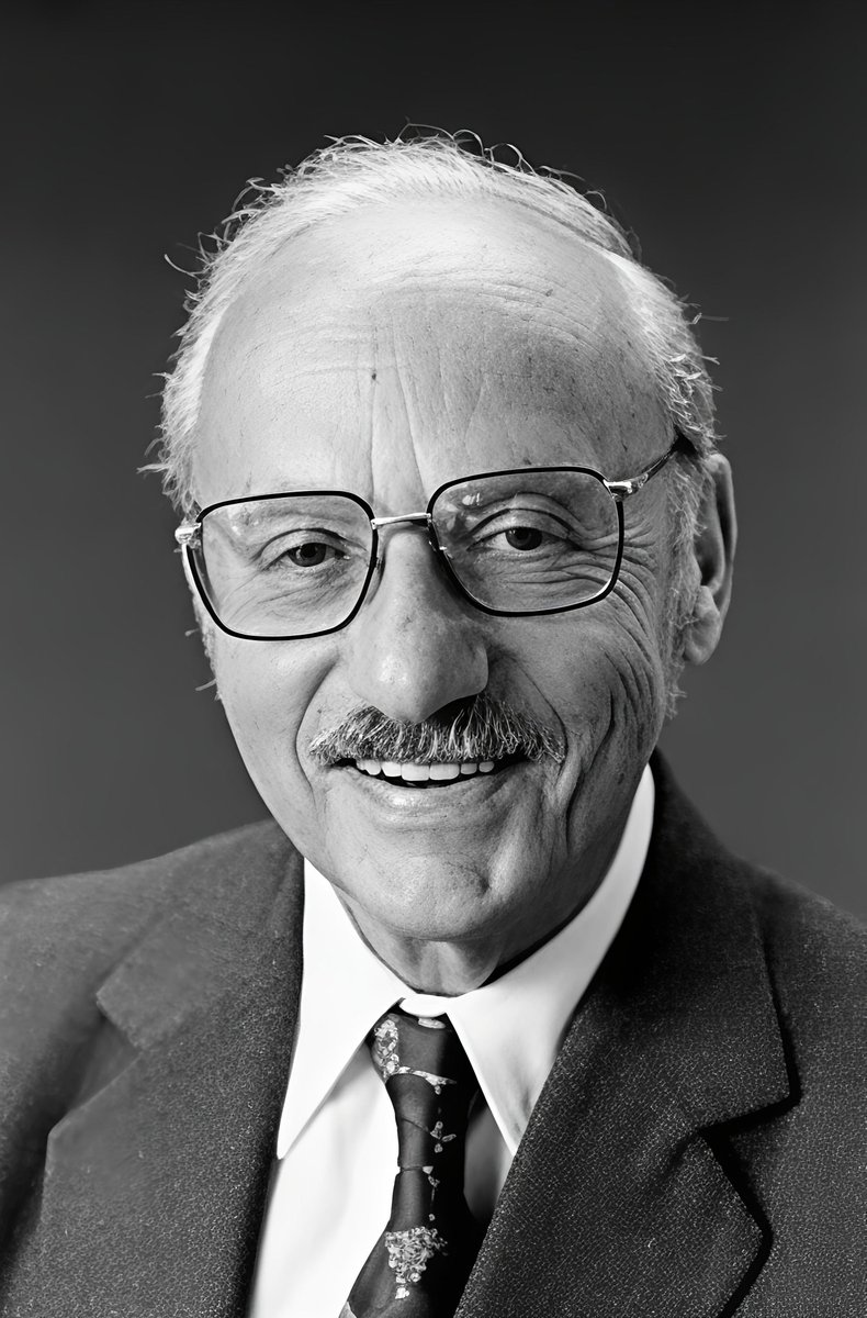 Math_files's tweet photo. One morning in 1939, a young doctoral student named George Bernard Dantzig hurried into his statistics class at the University of California, Berkeley—late.

The blackboard was already packed with equations. Professor Jerzy Neyman, one of the leading statisticians of the time, was about to erase it.

“Just a moment,” Dantzig asked, quickly copying everything down. Among the notes were two problems, which he assumed were ordinary homework assignments.

At home, Dantzig noticed something strange. These problems were far harder than usual. Still, he worked on them relentlessly and eventually found solutions—so late, in fact, that he handed them in with an apology.

Neyman barely looked up. “Just leave them on my desk,” he said, pointing to a chaotic pile of papers.

Weeks passed.

Then, one Sunday morning, there was a knock at Dantzig’s door. It was Professor Neyman—excited, holding a stack of typed pages.

“Read this immediately,” Neyman said. “I’m submitting it for publication today.”

Dantzig was stunned. His “homework” had become a research paper.

What he had copied from the blackboard were not assignments at all, but two famous statistical conjectures that had resisted proof for years. Unaware of their reputation, Dantzig had simply treated them as difficult exercises—and solved them.

That same student would later become the father of linear programming, inventing the simplex algorithm, a cornerstone of modern optimization and operations research.

Sometimes, the biggest breakthroughs happen when you don’t know something is supposed to be impossible.
