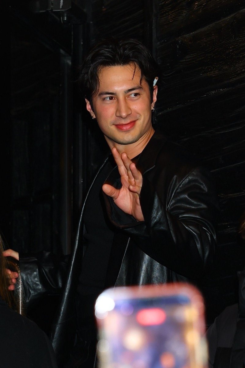 shane with a cigarette on his ear because he confiscated it from ilya but didn’t want to litter by throwing it on the floor