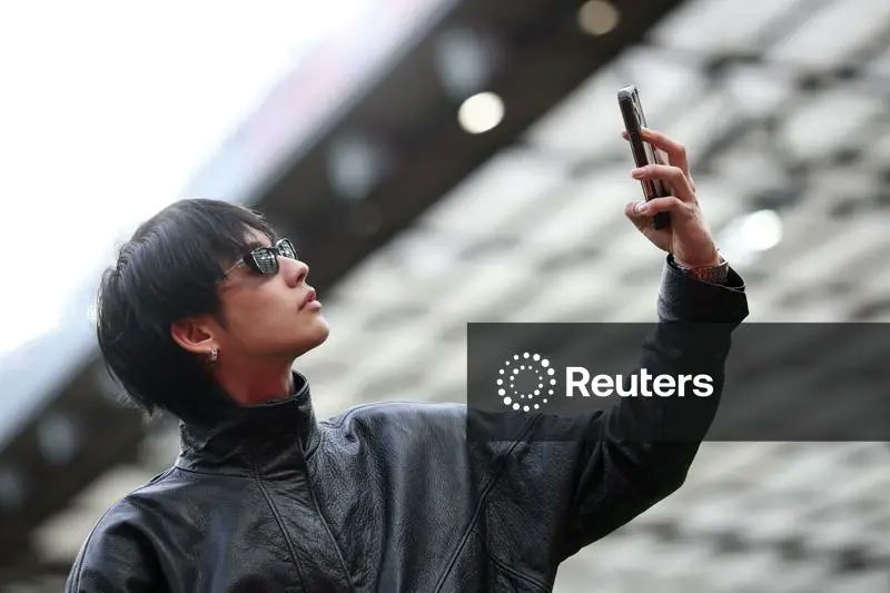 [ Reuter Connect : Premier League - Manchester United v Crystal Palace ] 

Soccer Football - Premier League - Manchester United v Crystal Palace - Old Trafford, Manchester, Britain - March 1, 2026 Actor and singer Vachirawit Chivaaree also known as Bright with Manchester United