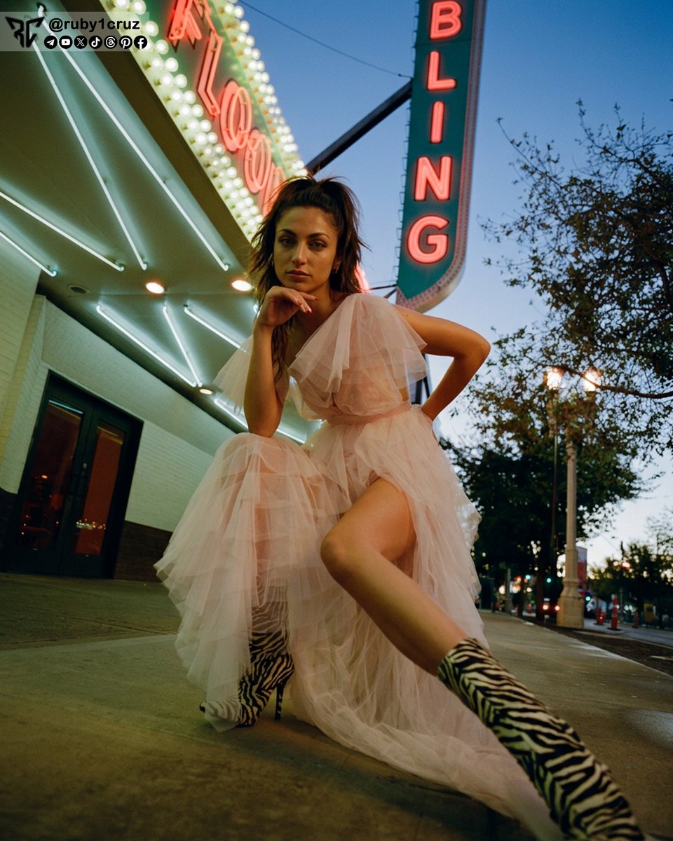 ruby1cruz's tweet photo. City lights… or am I the main event? ✨
Soft tulle, bold stance, messy pony and that zebra moment.
I wanted drama, so I wore it.
Would you own this sidewalk like this or play it safe?
#BrunetteWaves #TulleDress #SoftGlamMakeup #FrenchTipNails #NeonStreetStyle https://t.co/ULgrzyPp7g