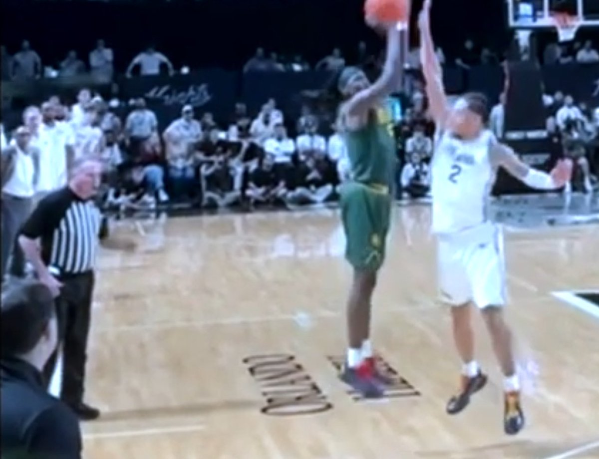 The ref that decided the UCF/Baylor game thought this was the moment Riley Kugel fouled the Baylor shooter. You can see him beginning to raise his arm to call the foul.

This guy needs to never ref another game in college sports.