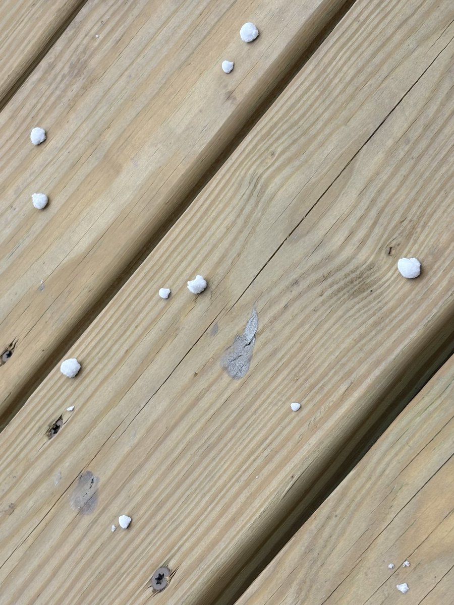 cwalteroverman's tweet photo. Sounds like hail but looks like graupel, just off of Cookingham near 435. @JacobLanierWx @NWSKansasCity https://t.co/2P1bZRb1YI