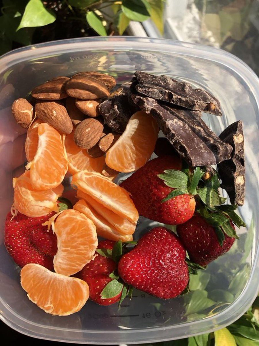 i see tangerines, dates, and strawberries, what fruit is the last one?