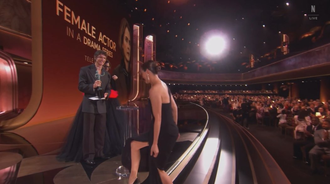 weltonsrichmond's tweet image. connor storrie handing the award to keri russell this was made for me