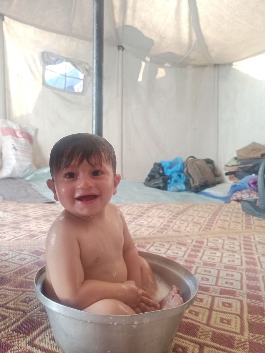 gaza_bilal's tweet photo. My child is homeless and without clothes 💔

Look how my little boy bathes in a cooking pot. There's no bathroom, no clothes, not even shelter. We've been living in a tattered tent for over two years since the war. 

We are telling the world to help us provide a new tent and clothes for my young children. We are dying here in the most horrific ways. Where are human rights? Where are those influential people on social media? Stand with us and amplify our voice, even if you are unable to donate. 

Do your children live like this? Bathe without a shower? Sleep without food or milk? Don't they have a home to sleep in? We are dying here every day. Please help me. 

Share, quote, donate, leave a comment or a dot 🙏
https://t.co/4ZvvC144iQ…

@ireallyhateyou @mikerecine @VintageVault8 @MetaReflexive @ISASaxonists @SallyMo70506324  @meralhece @umaymohamed @TahrirFilastein @yipengGe @mothDOOMtongue @eemaanishere @eathedocument @timchals @JustinRJ5597 @NewSandr2  @soulkhan @goldenintifada @buffetbreaker  @soapneyy @MissPavIichenko @shivlestat @lukeisamazing @SanaSaeed @snackvampire @EFFEXWH0RE @fbgcon @awoodustin @ehsan_tork16046   @matlesmatle @TheEggpie  @DrNeenaJha @AlisonGeorge10 @ThatTimWalker @iskandrah
