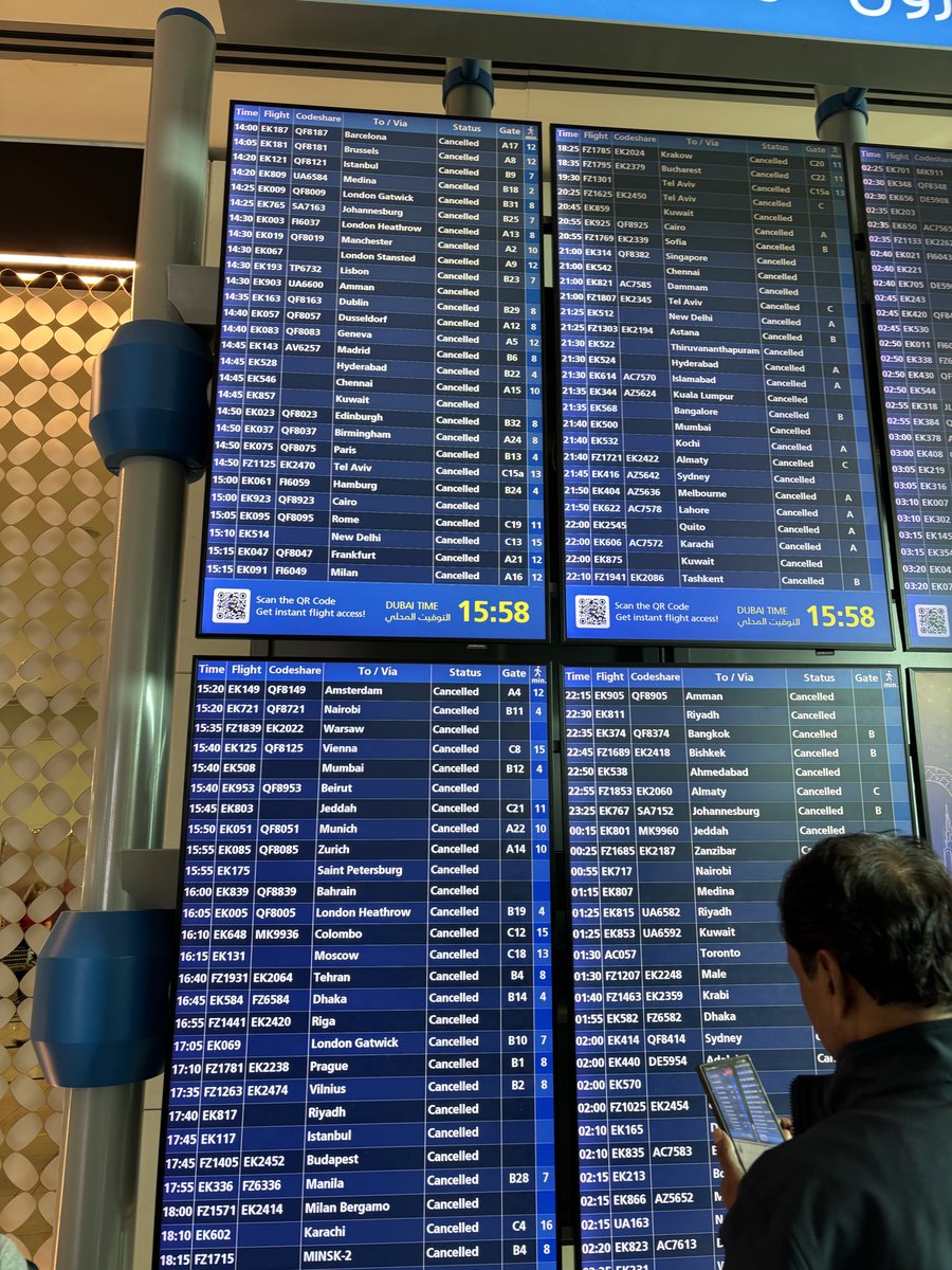jitendra2198's tweet photo. Method in madness is what was observed at Dubai airport #DXB on 28 Feb.

Travelling on Emirates EK511 & EK719 with a 2.5 hour transit time in Dubai, we were all set to start a new chapter in our lives at Nairobi. Even our 2 year old #GoldenRetriever was travelling along with us as excess baggage in the cargo hold.

30 mins before landing captain made an announcement that he had been asked to divert to #Muscat due to airspace restrictions. 

That’s when I switched my inflight entertainment to the onboard live news feed only to realise that skies over Dubai were not safe and were in the middle of a war zone in a #Boeing777. There was stress and panic in the cabin and being a pilot myself, I can guess that cockpit environment would have been similar with additional pressure on the crew.
The captain, however, sounded composed when he next announced that a small window of safety was available and we were landing in #Dubai in 5 mins. 

Post landing all transit passengers (including us) were seen rushing to their next gates for departure. Little did we know then that it was going to be a long day for us.

Soon all info boards displayed delays and eventually all flight operations were suspended. We, like others, were stranded in Dubai airport with visa and no idea of what was about to happen. As a first relief measure meal vouchers were dropped in via emails to all transit passengers and long queues were seen at eating joints.

That is when Emirates in conjunction with  airport authorities and support staff took control of the situation.

Queues were organised, emergency Visas were issued to passengers in transit, accommodation was provided by airlines and multiple support and info spots were set up at the airport.

There was chaos but it seemed like the SOPs were in place and while the airline and airport staff was overwhelmed, they seem to know what they were doing.

Even amidst crisis humility and humanity prevailed, 10s of thousands of passengers were seen rushing without direction. Airport staff got separate queues for elderly and passengers with kids. We were travelling with a toddler along and were escorted to Emirates travel desk. Someone from the support team then guided us to a bus which dropped us to a hotel. I was amazed to see people with ‘Emirates support team’ vests even at the hotel reception.

We have been constantly checking on our Pet was on the same flight as us and multiple sources at Emirates have assured us that pets are being looked after well even amidst this ongoing crisis and bombs debris falling all over.

While everyone at the airlines and airport is overloaded with out of routine tasks, it feels that they know what they are doing. #DBX was hit (drone/bomb/debris I am not sure) but different contacts who could manage to get some unconfirmed info told us that Emirates has evacuated the airport including pets. 

Hope we are able to fly to our destination soon.