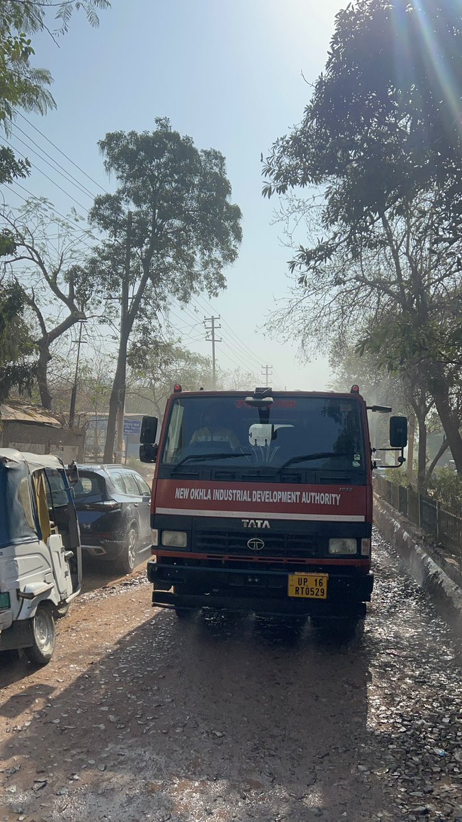 Sec50Antriksh's tweet photo. @CMOfficeUP @noida_authority cannot fix the road for last 1 year but wants to do eye wash by watering the road driving wrong side and stopping traffic at the peak office hour. Would @noidapolice take action? 

@dmgbnagar @CMOfficeUP @myogioffice @myogiadityanath @PankajSinghBJP @PMOIndia https://t.co/HrDn0J4fdn