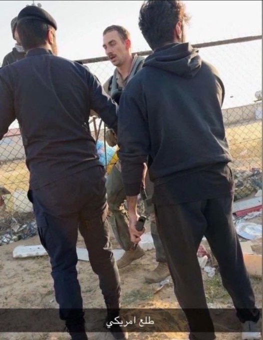 Truthtellerftm's tweet image. An injured American army pilot that evacuated  his jet and is in the back of a trunk caught by Kuwaitis. 

So much for air superiority! 

The Kuwaitis say:
“Call an ambulance… He’s American leave him”