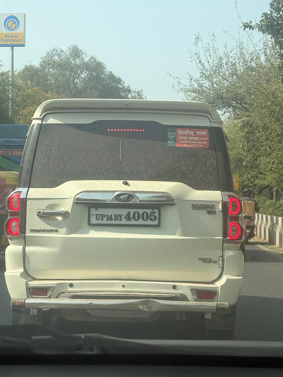 manpreet_karan's tweet photo. @dtptraffic violation of LMV rules : black tint on the rear window no high security number late using of political party sticker. 
Location: Delhi Agra Highway opposite New friends colony community centre
Date &amp; Time: 28 Feb 2026 2:48 PM https://t.co/3I5tt8Lxjb