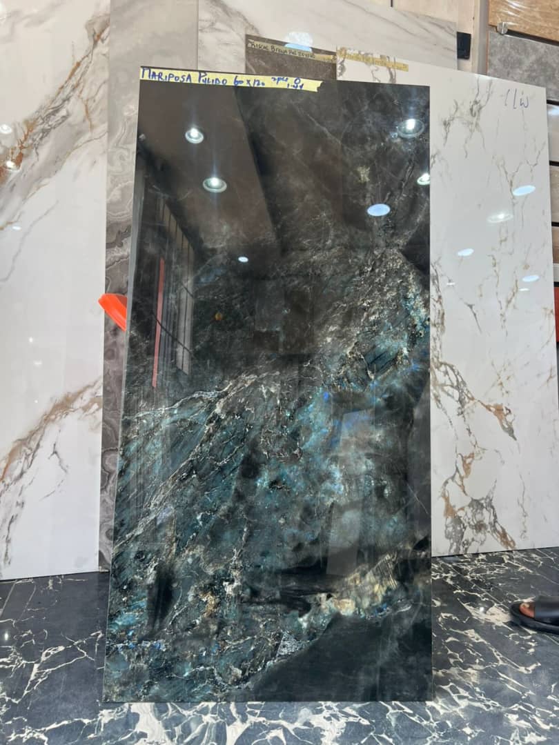 CrystalzLimited's tweet photo. Design Tip: Bold surfaces are the new neutrals. 🏠
​The Mariposa Pulido from Spain is proving that deep blues and polished finishes are the ultimate choice for 2026 luxury interiors. Large format (60 \text{x} 120) means fewer grout lines and a seamless, marble-look finish.
​Ready https://t.co/ri6YMQFg0c