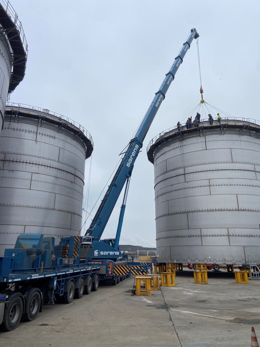 Sarens's tweet photo. At #Ivens #Construction in #Antwerp, Sarens installed three huge tank roofs, delivering a precise lifting solution for our long-term trusted partners. What’s the top benefit of collaboration? https://t.co/69YOKA5gtN #NothingTooHeavy https://t.co/TntO3uDwdG
