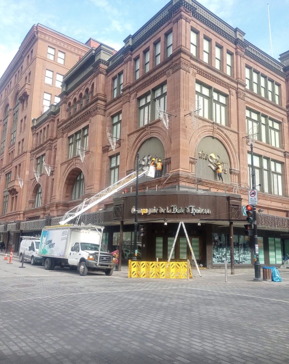 The removal of the iconic The Bay sign this morning in Downtown Montreal 😢
