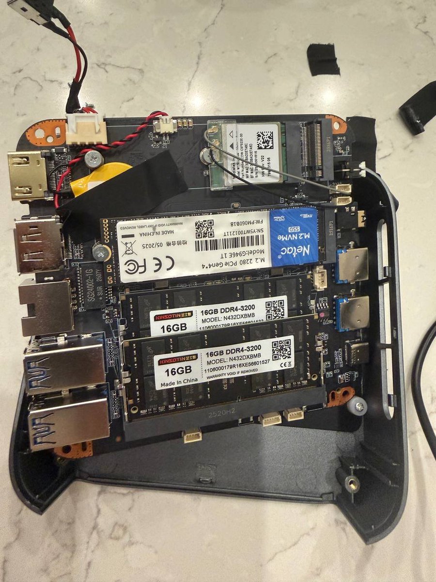 demarco's tweet photo. My Magace mini PC burned last night. 32GB RAM, NVMe SSD, running AI agents 24/7.

Had to crack it open and extract the SSD to recover files.

Lesson: if you're running local AI infra — back up your drives. RAID or cloud sync. Not "I'll do it tomorrow." (1/2) https://t.co/0tex9QPQ5B