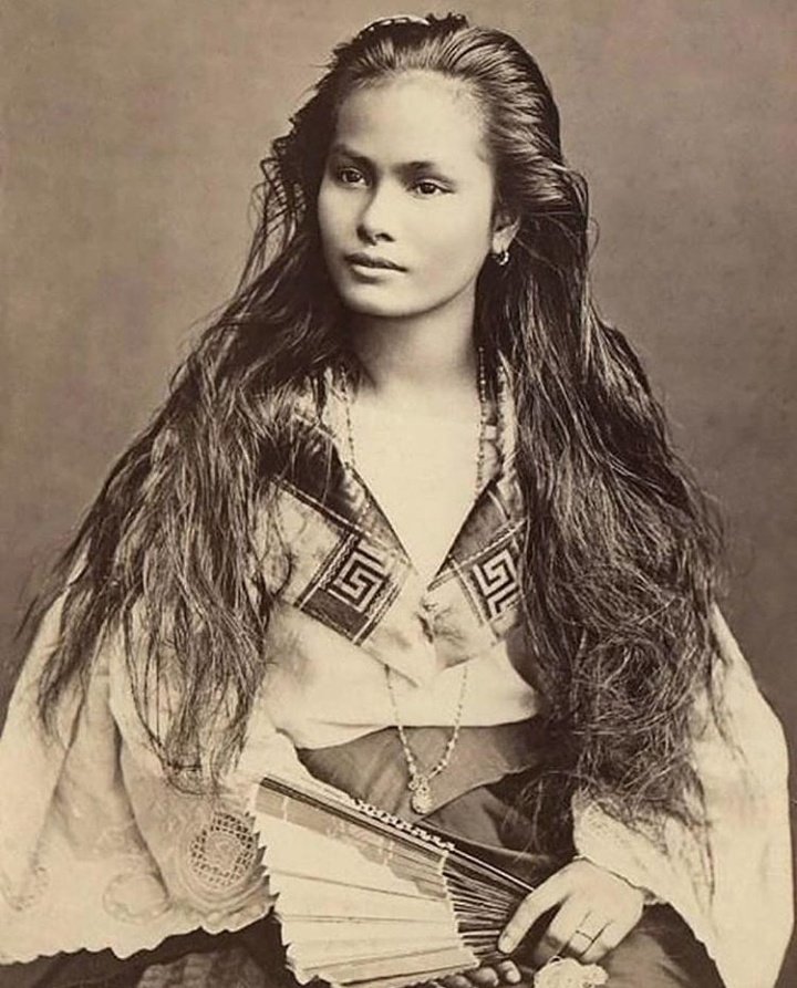 Portrait of an unidentified woman from Luzon, an island in northern Philippines. Photographed in 1875.