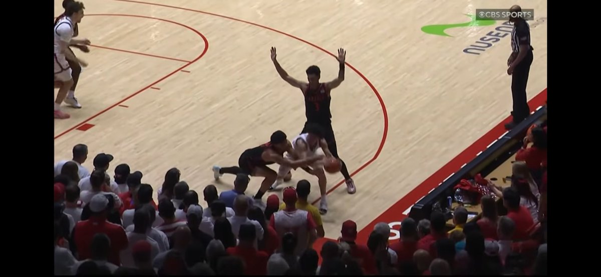 dashroom34's tweet photo. @coachmosser SDSU fouled Uriah but there was no call. Ball looks like it does touch SDSU players jersey. We also can't forget about the no call shot clock violation in the first half. If refs don't blow the call on missing Uriah getting fouled, then we don't even have controversy https://t.co/kyxA1fD8Q6