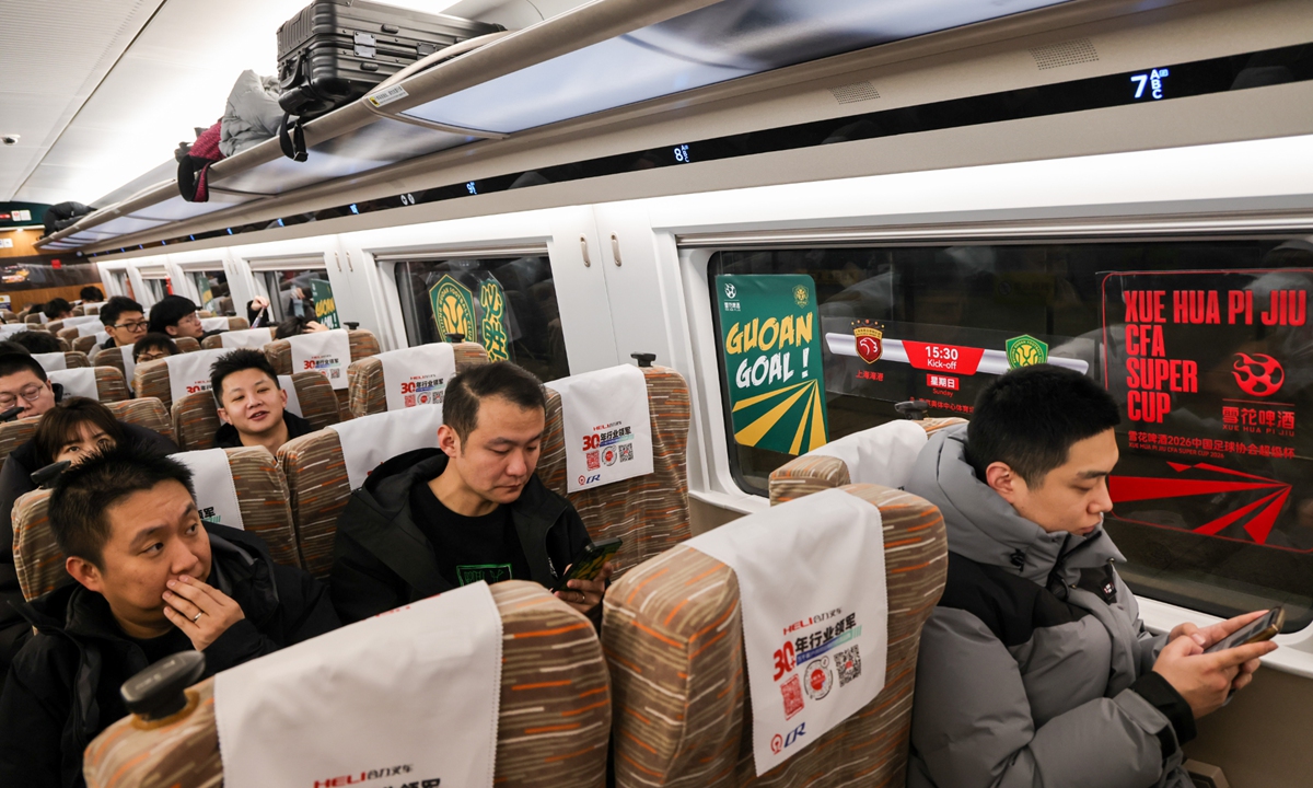 globaltimesnews's tweet image. Clad in their team colors and waving scarves, nearly 400 supporters of Chinese Super League club Shanghai Port boarded a dedicated high-speed #train to Nanjing, East China’s Jiangsu Province for the 2026 Chinese FA Super Cup final on Sunday. By extending the emotional arc of