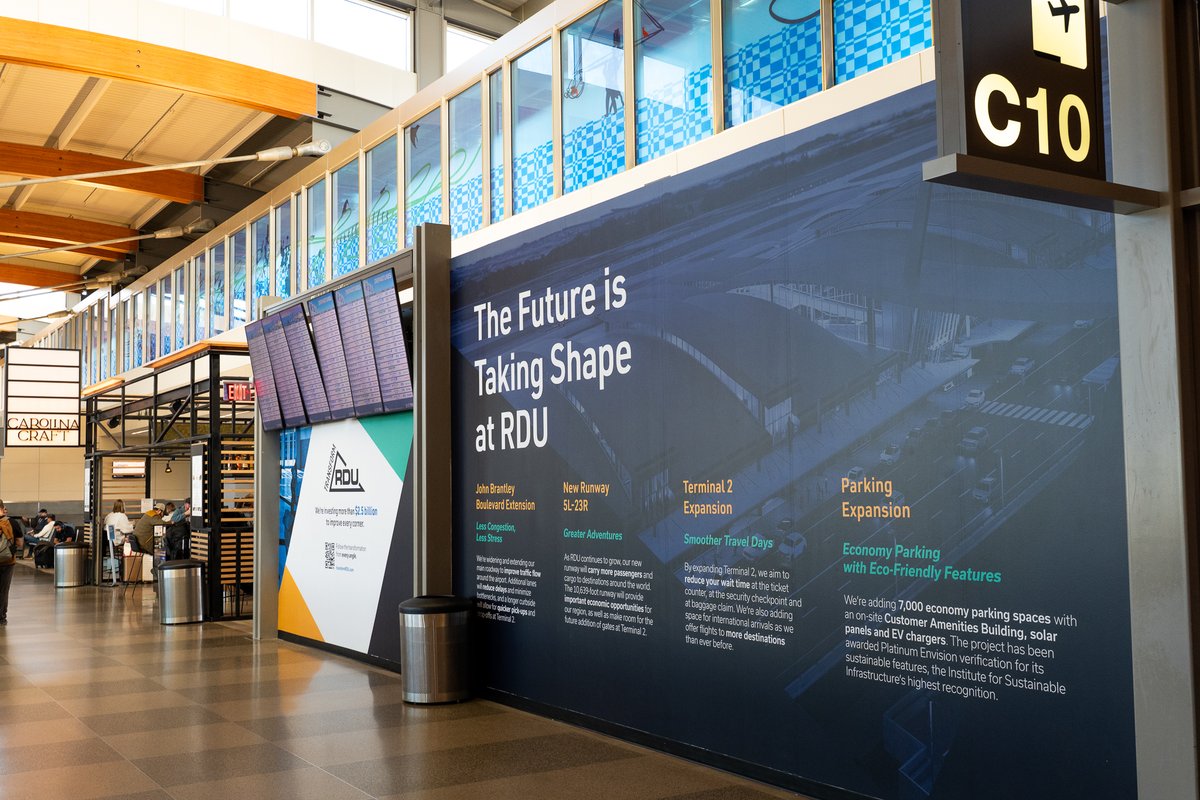 RDUAirport's tweet photo. Next time you're walking through Terminal 2, see if you spot our new #TransformRDU info walls. π Displays like this one at Gate C10 include details about the four major projects under construction at the airport.
Don't want to wait? Read up on them at https://t.co/A5UjrRQmUS. https://t.co/RSKgm8L46i