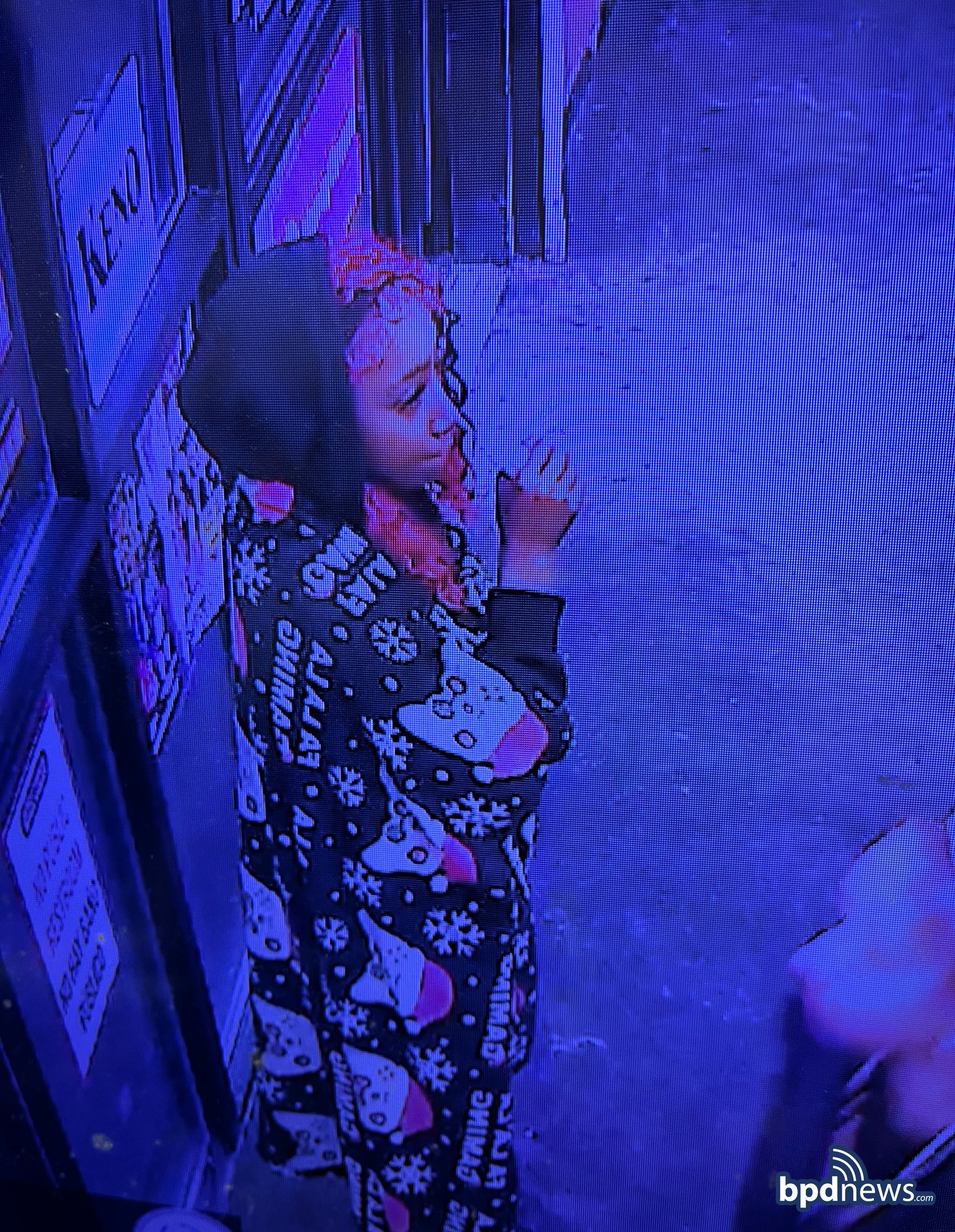 Surveillance image of suspect in patterned pajamas