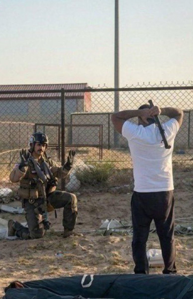 RabbiPoupko's tweet photo. Kudos to this brave American 🇺🇸 pilot for keeping his cool composure. 

 After his airplane was shot down accidentally in Kuwait, when he landed locals thought he was an Iranian pilot and they were about to attack him with a crowbar. 

His cool composure and courage saved the day.
