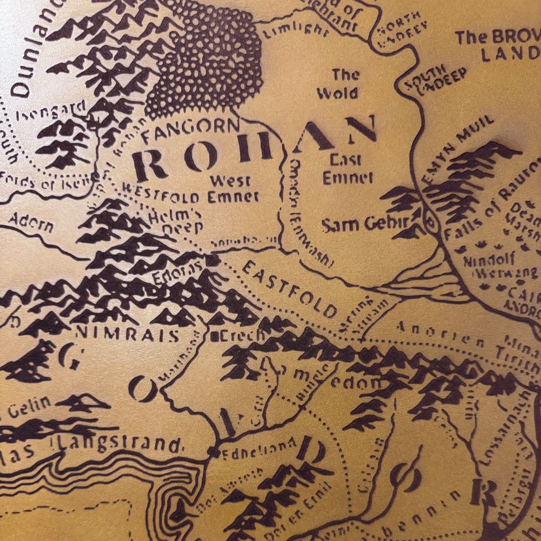 TASLaser's tweet photo. CO₂ engraving on leather gives such a nice contrast 👌
This Lord of the Rings map detail came out beautifully. https://t.co/bwzYjPmaFD