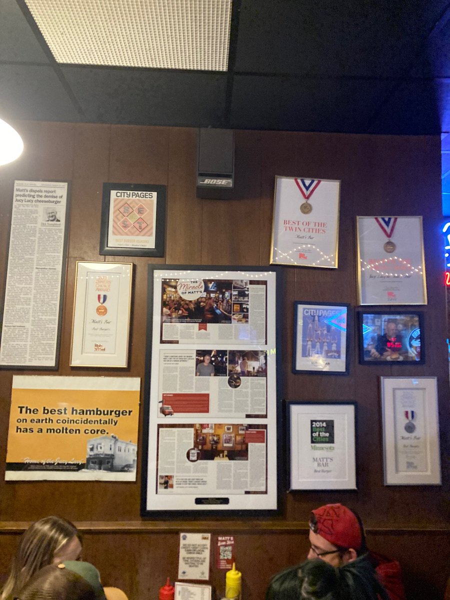 TCBmag's tweet image. We spoke with Matt's owner Scott Nelson last summer for a print story that uncovers the Jucy Lucy business and its #Minneapolis legacy. Looks like Nelson has framed our story, hanging it on a wall among various plaudits. Read "The Miracle of Matt's" here: tcbmag.com/the-miracle-of…