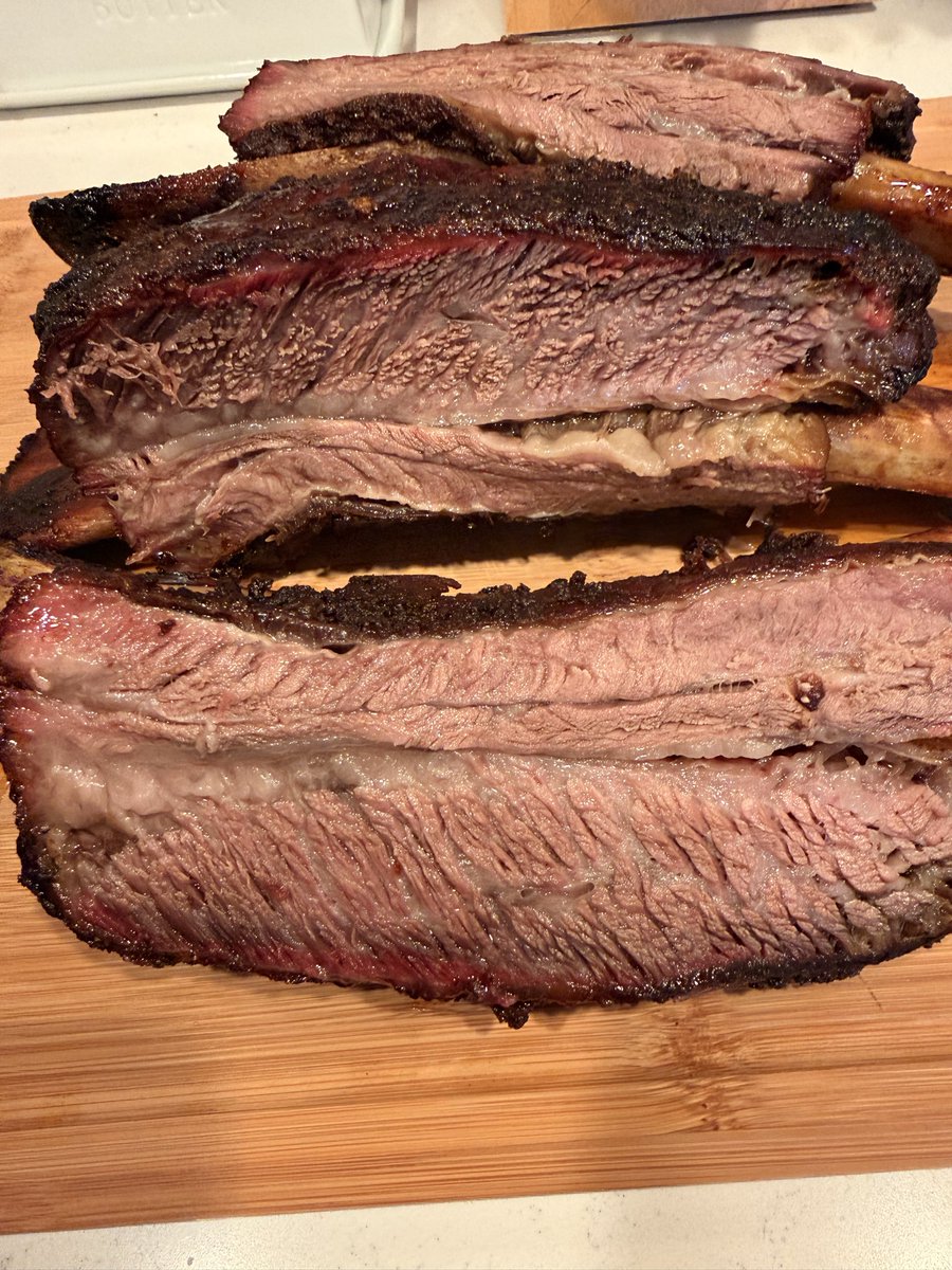 TruBluDad's tweet photo. Finished product…. Soooo rich… it was straight Fab!…. 
#CleanBone @DadsSeasonings 
Thanks to @chadmask_msu for all his videos the other day! Followed several of his steps. Dry brine, Layered seasonings, temps, wrap time etc… 
Prays for our troops!! #USA 🇺🇸 https://t.co/sF4MD99v87